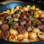 Cajun Steak Bites and Cheesy Garlic Shells Skillet